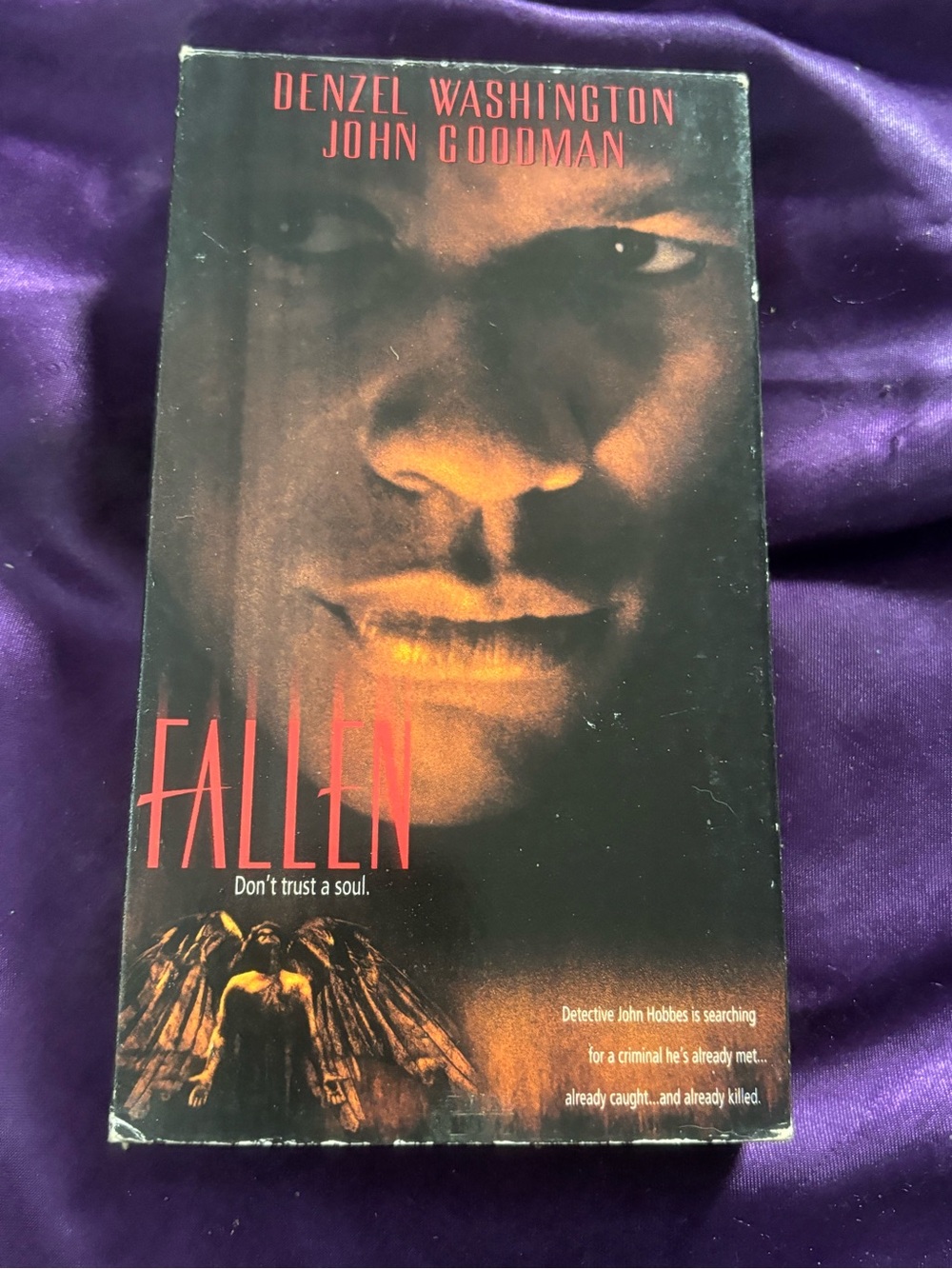 Warner Bros. Fallen VHS Cover in Black and Purple with Red Text